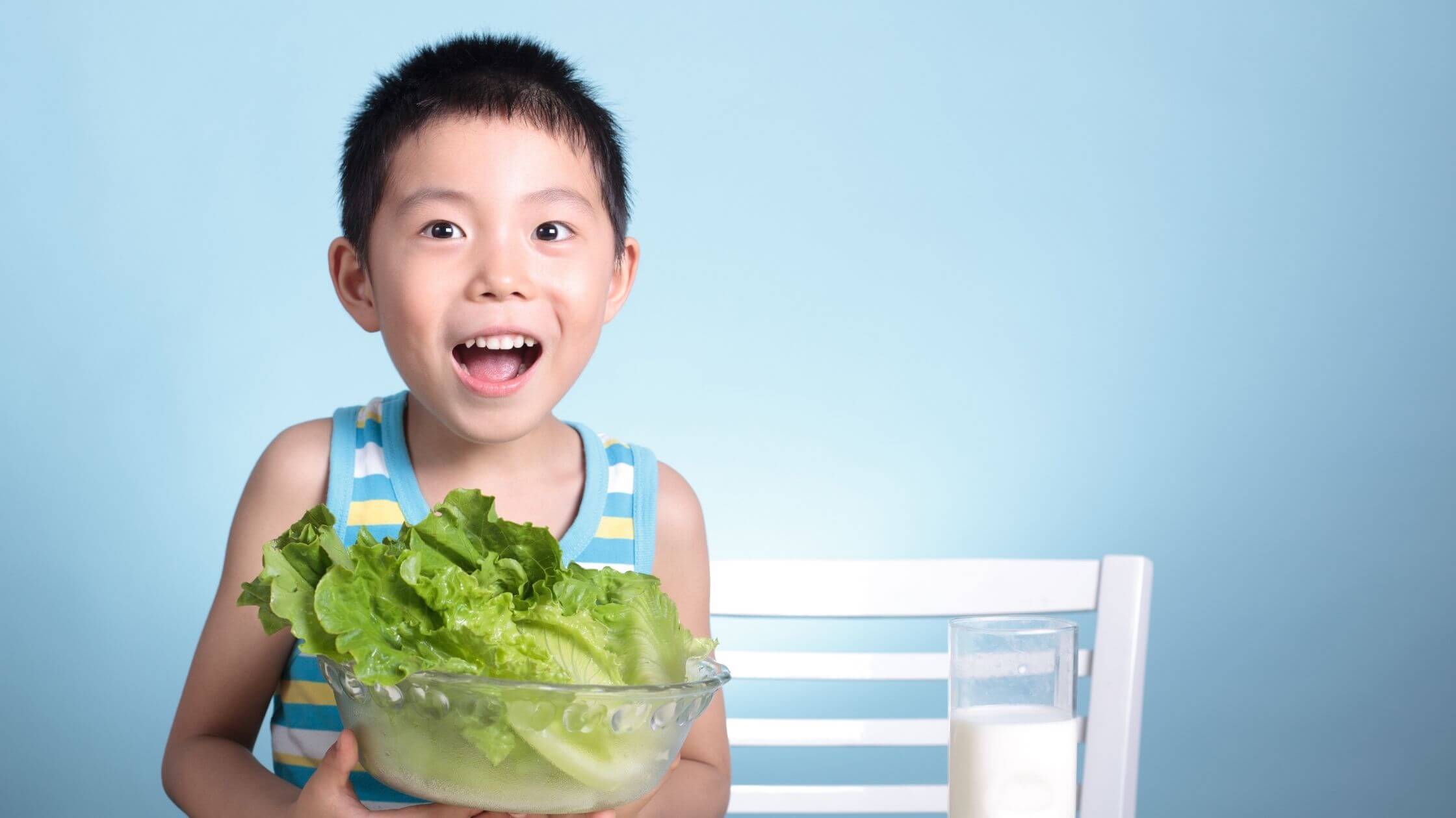 happy child with lettuce